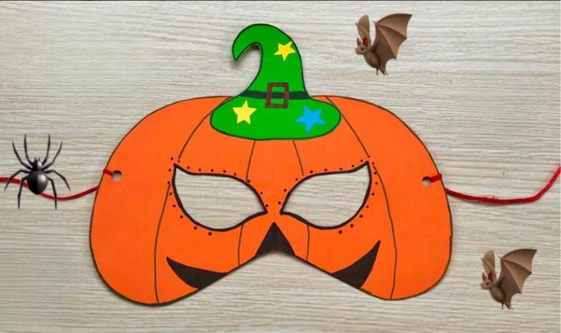 Mặt nạ bí ngô Halloween đội mũ phù thủy xanh có ngôi sao